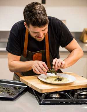 Tom Hunt preparing his dish for Foodism