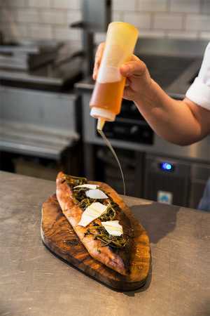 Selin Kiazim making her octopus pide at her restuarant, Oklava