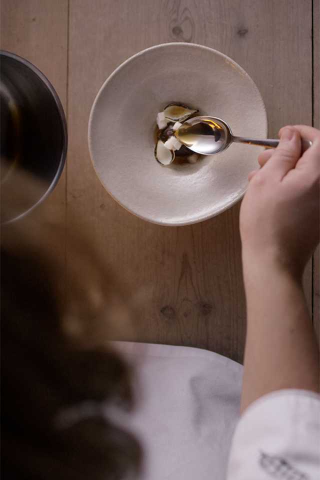 Chef Magnus Nilsson prepares a dish in an episode of Chef's Table