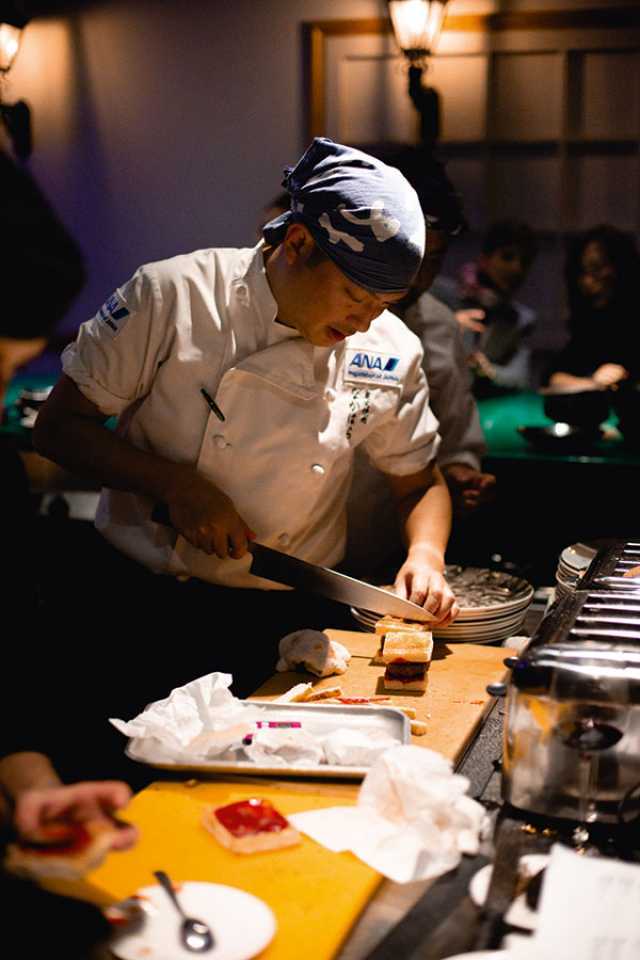 Kentaro Nakahara cooking at ANA's Culinary Journeys event