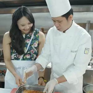 Ching in the kitchen during the filming of Ching's Amazing Asia
