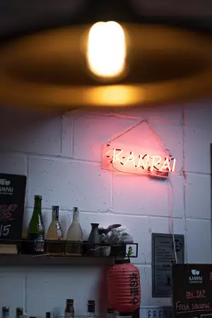 A sign at the bar at Kanpai