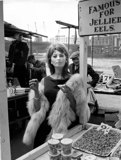 Italian actress Sophia Loren on the set of film The Millionairess stood next to the Tubby Isaac’s and Barney’s Eels stalls at Billingsgate Market in 1960 Italian actress Sophia Loren on the set of film The Millionairess stood next to the Tubby Isaac’s and Barney’s Eels stalls at Billingsgate Market in 1960