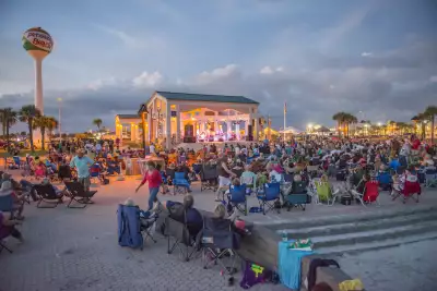 A crowd gathers for the &lsquo;Bands on the Beach&rsquo; music series featuring rotating artists every Tuesday night from April to October