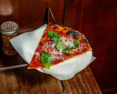 Slice of Vincenzo's pizza