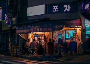 A pojangmacha, a tented street food stall or casual outdoor restaurant commonly found in Seoul A pojangmacha, a tented street food stall or casual outdoor restaurant commonly found in Seoul