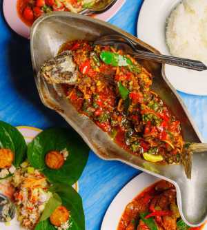 Whole crispy fried seabass with green peppercorns