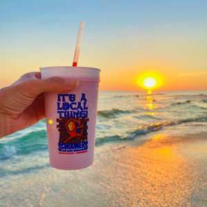 A signature cocktail at Schooners served at sunset &ndash; a bar on Panama City Beach which guarantees a good time, and perhaps a sore head