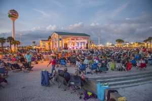 A crowd gathers for the &lsquo;Bands on the Beach&rsquo; music series featuring rotating artists every Tuesday night from April to October