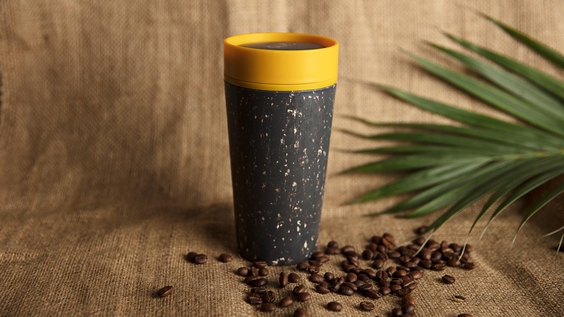 rCUP's reusable coffee cup in mustard and black rCUP's reusable coffee cup in mustard and black