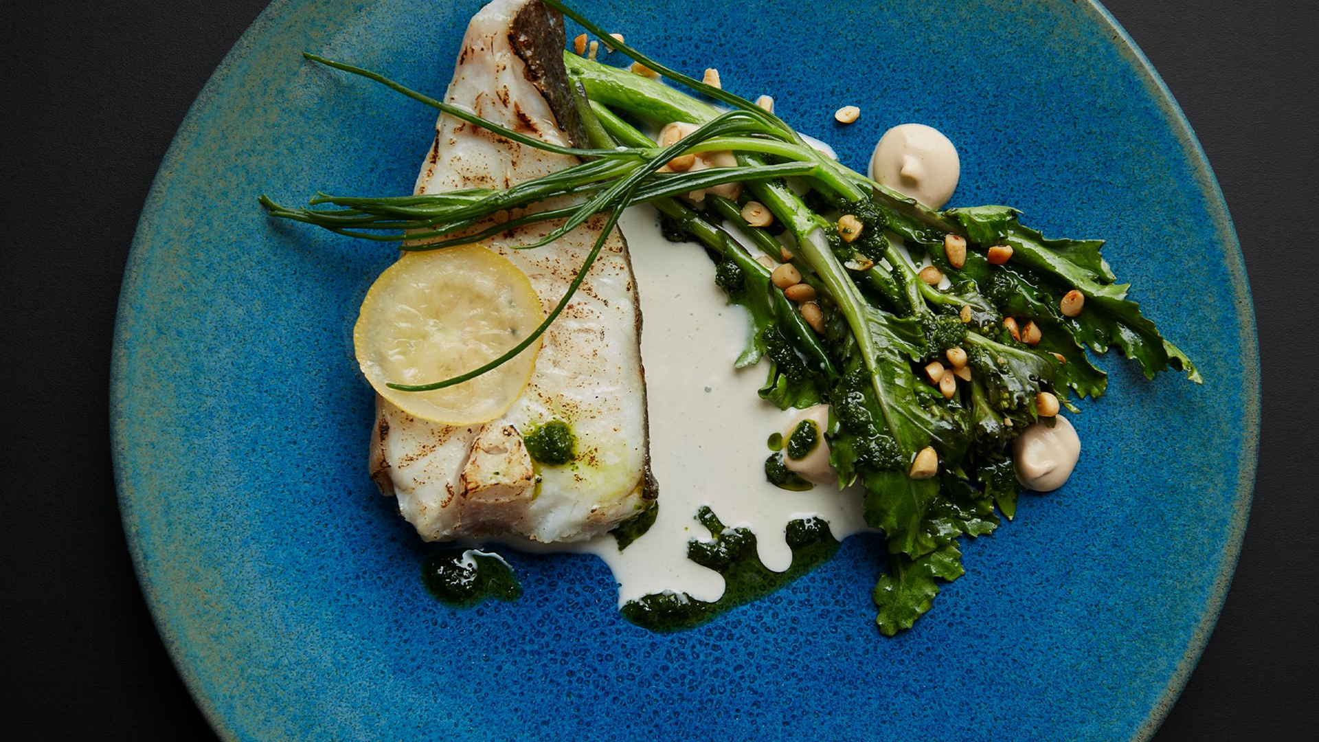 Market fish with anchovies at Neo Bistro. Photograph by Joakim Blockstrom Market fish with anchovies at Neo Bistro. Photograph by Joakim Blockstrom