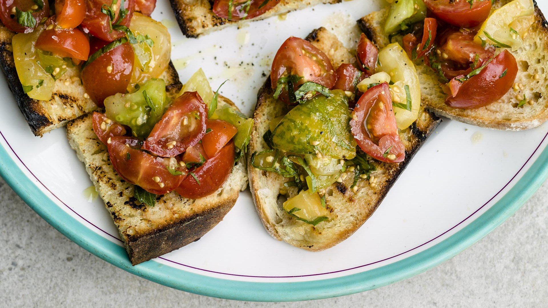 Organic seasonal tomatoes make a fantastic base for bruschetta Organic seasonal tomatoes make a fantastic base for bruschetta