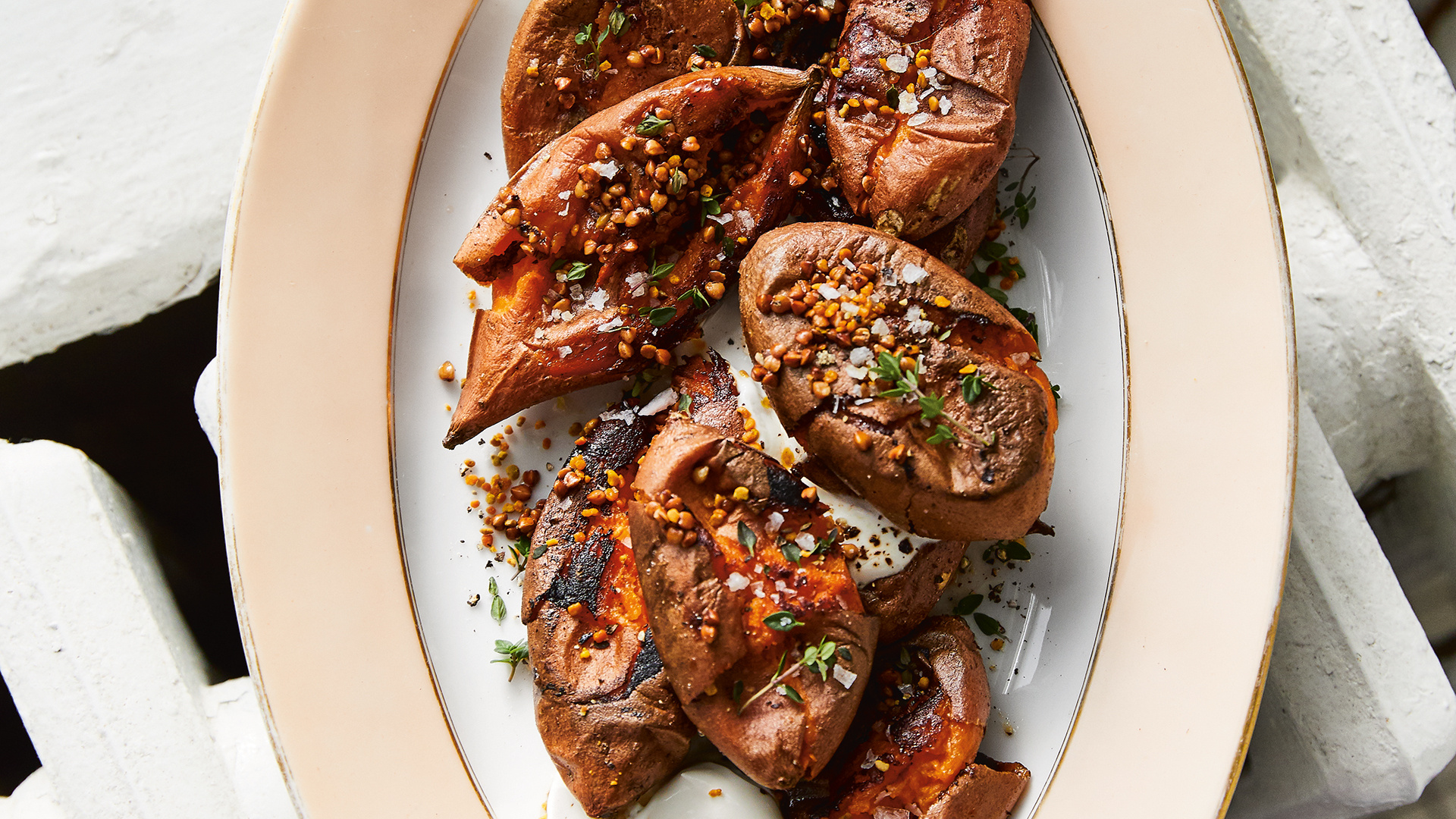 Make Alison Roman’s smashed sweet potatoes with maple syrup and sour