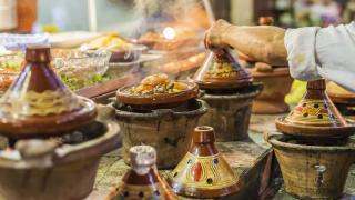 Moroccan tagines – sweet and sour braises of meat, vegetable, fruit and nut cooked in special cone-shaped pots – can be found all over Marrakech