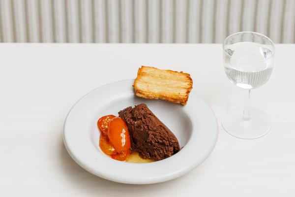 Malted chocolate mousse, candied kumquats and a palmier