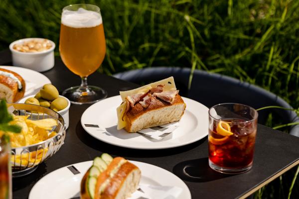 A selection of buns, beers, snacks and cocktails at Lasdun Summer Terrace
