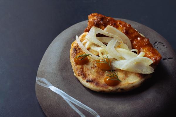 Puffed Northumberland spelt and coconut pol-roti with a hot devilled glazed freshwater prawn, mango chutney, green tea and jasmine pickled fennel and Aweside Farm cola herbs