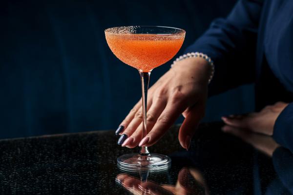 Woman holding a cocktail glass