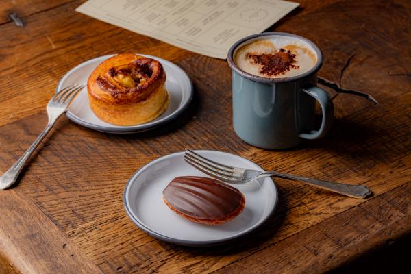 A chocolate madeleine and cinnamon bun