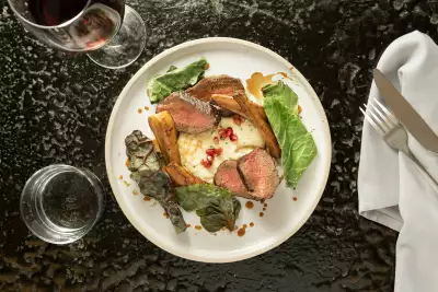 Venison loin with parsnip and pomegranate