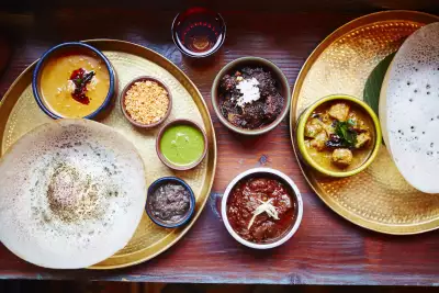 Egg hopper, plain hopper, karis, sambols and chutney
