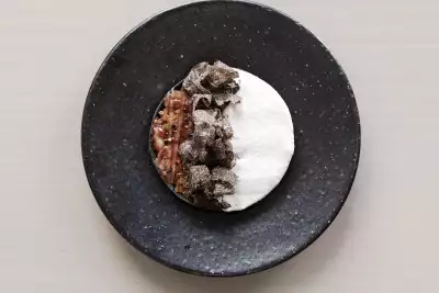 Goose skirt from Highland wagyu mixed with Sollip-made gochujang aged for years, cured daikon, and truffle cream