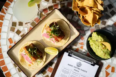 Tomatillo-agave glazed pork belly tacos