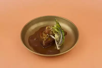 Dark rum and raisin glazed pork belly