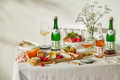 A table scene featuring Alt. Blanc de Blancs and Alt. Rose