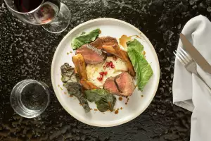 Venison loin with parsnip and pomegranate