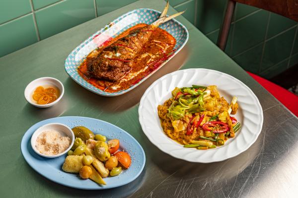 The fried mackerel alongside other tongue tingling dishes