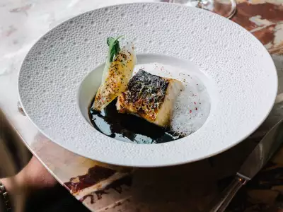 Caramelised black cod, Malabar pepper sauce and coconut milk foam