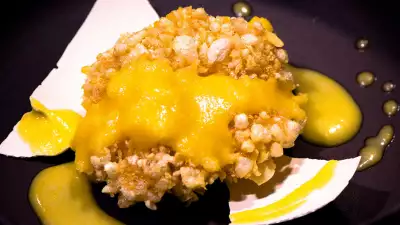 A 'freshly hatched' chicken nugget covered in yolk