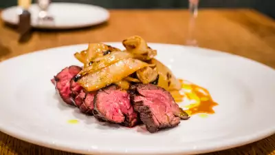 Mangalitsa chop with charred pickled onions at Pitt Cue