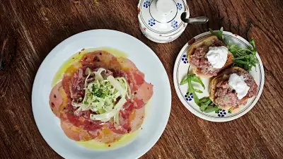Tuna carpaccio with pink peppercorn, celery and lemon
