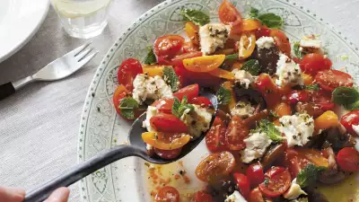 Anna Jones' traffic light tomatoes with lemon-roasted feta