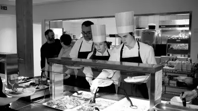 Chefs and students cooking at the Norwegian Seafood Council's offices