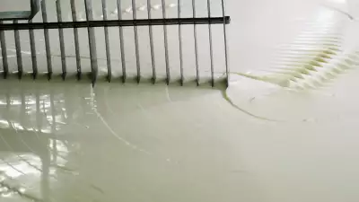 A machine breaking up curds
