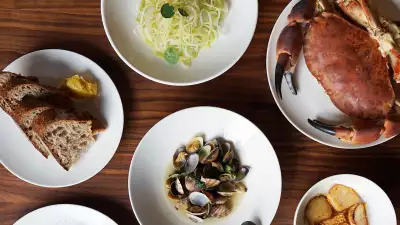 A selection of dishes from Londrino's menu, including the Snappery bakery sourdough and cultured butter