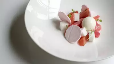 Pink rhubarb lightly poached and served with yoghurt sorbet and citrus from Roux at the Landau