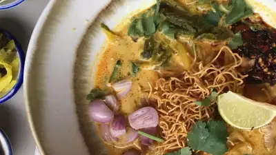 Khao soi gai, a huge, turmeric-yellow curried coconut noodle soup from Chiang Mai