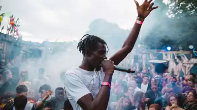 An artist at Standon Calling's Cowshed