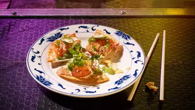 Loch Duart salmon sashimi pizza with truffle ponzu, jalapeno and wasabi tobiko