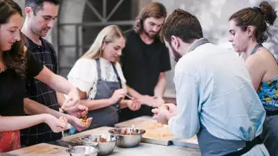Merlin Labron-Johnson teaching some kitchen skills during The Thinking Traveller's week-long 'culinary experience' at Rocca delle Tre Contrade