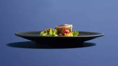 Seared tuna with tamarind roast potatoes, cucumber and pistachios