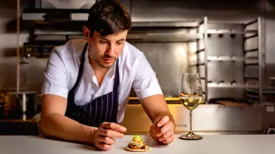 Chef Manu Canales with the foie gras kebabito