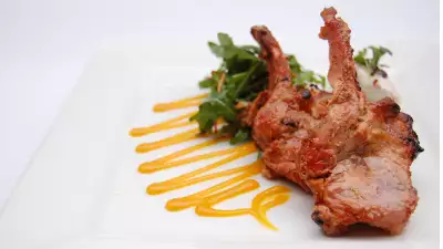 Clove smoked lamb chops with garlic yoghurt at Babur