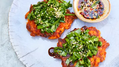 Make Meera Sodha’s kimchi pancakes with spinach salad