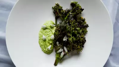 Chargrilled sea kale dressed in waste vegetable treacle and wild garlic at Silo