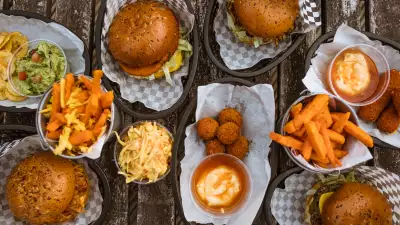 best places to eat vegan food in london, coleslaw, nachos, cheese sticks and burgers at Mooshies